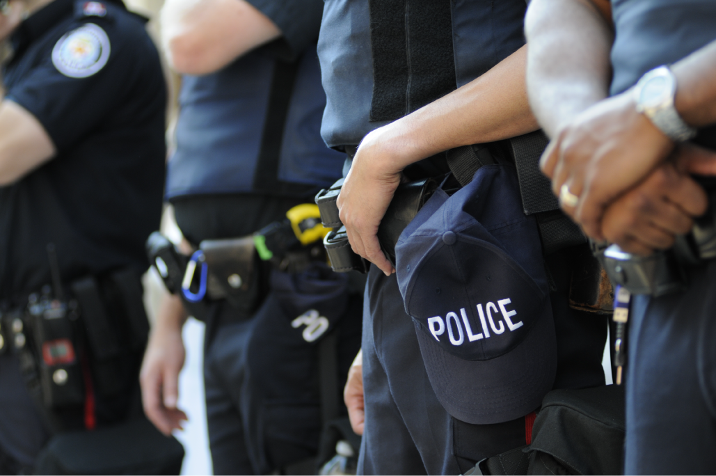 A close up of the police officer 's uniform